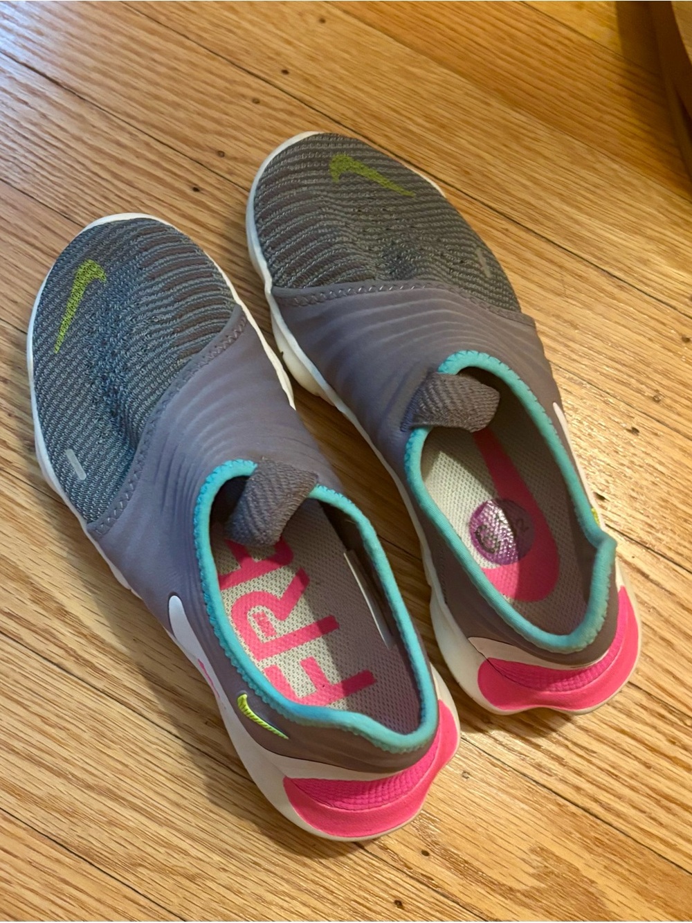 Nike Grey Slip-On Sneakers with Pink & Teal Accents